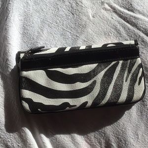 Women’s zebra design clutch bag.